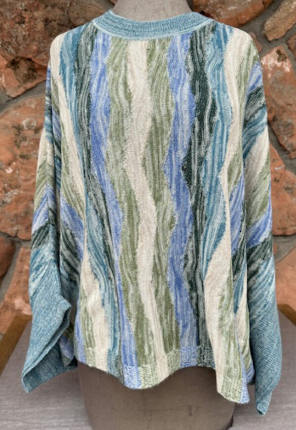 100% baby alpaca sleeved Ponchoblues/greens/beige